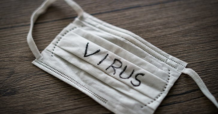 Cloth face mask with the word Virus written on it Cloth face mask with the word Virus written on it