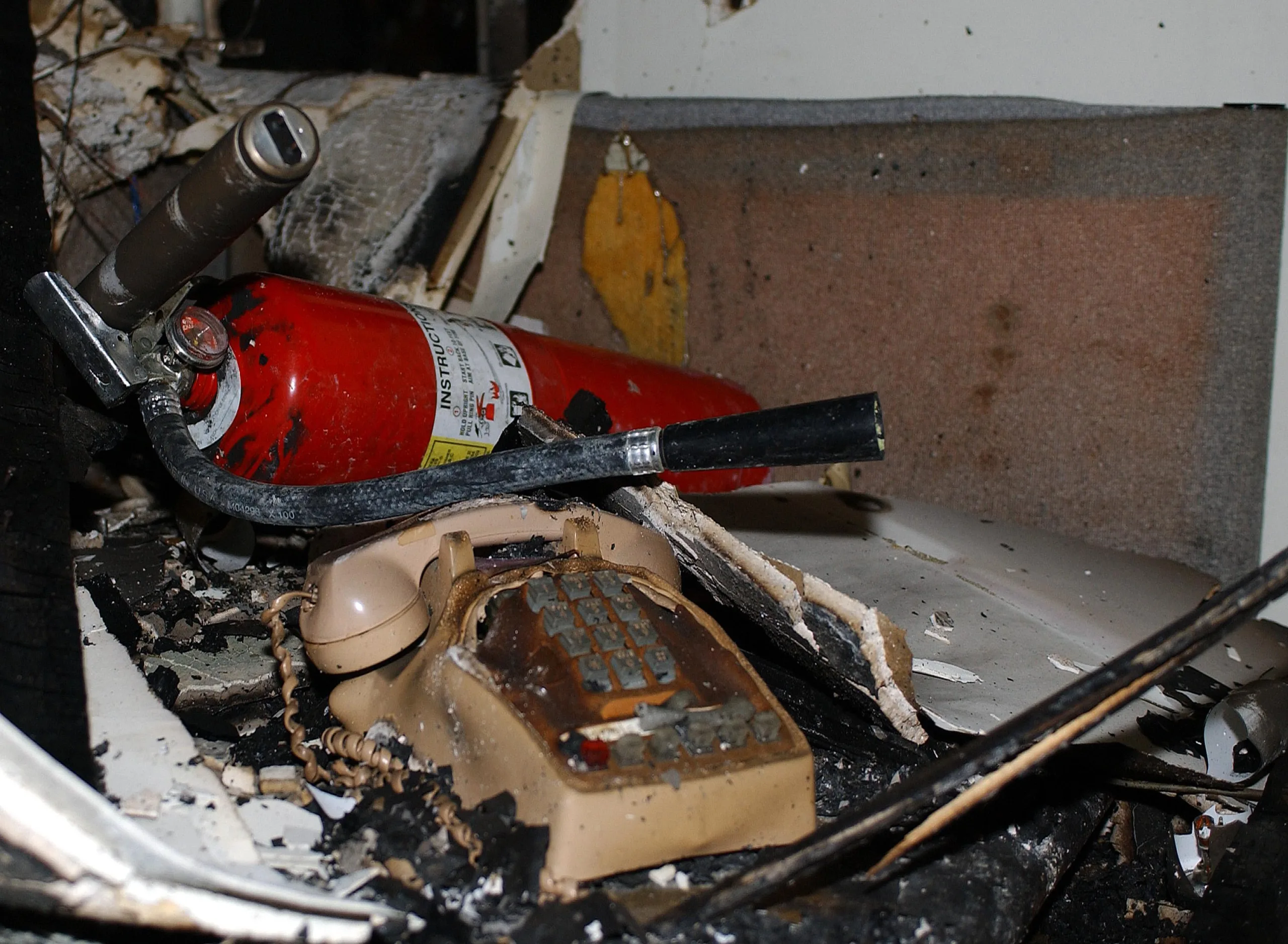 Burned and melted items sit atop an office desk inside the fifth floor of the Pentagon ( Image: Air Force photo by Staff Sgt. Larry A. Simmon)