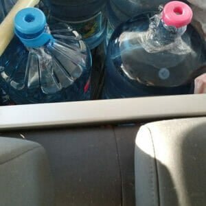 5-Gallon Jugs of water ready to shuttle
