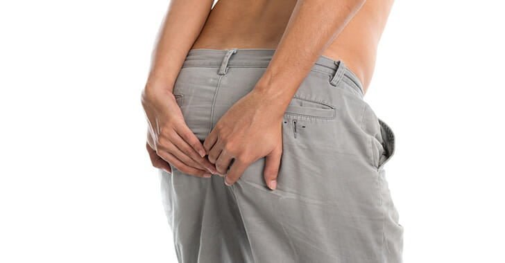 Holding back a big fart