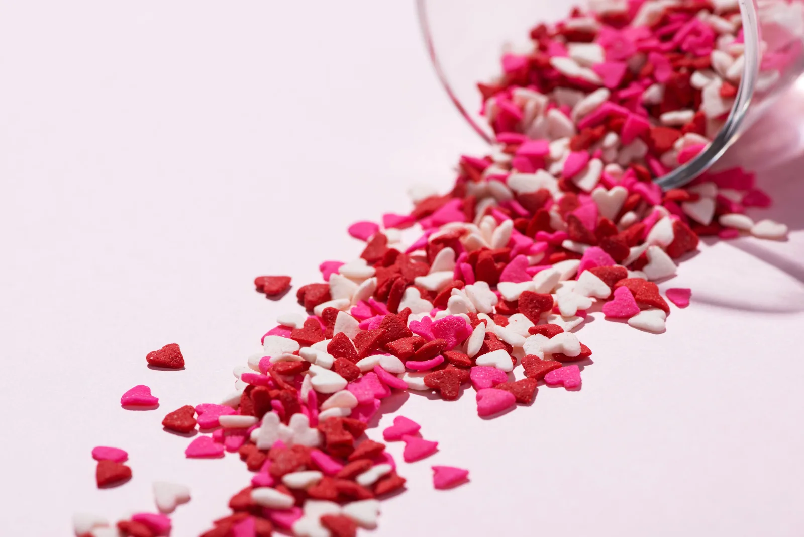 Valentine's Day glass with lots of sweet candy hearts