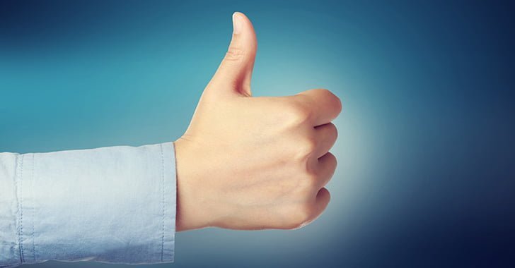 Man giving a thumbs up sign