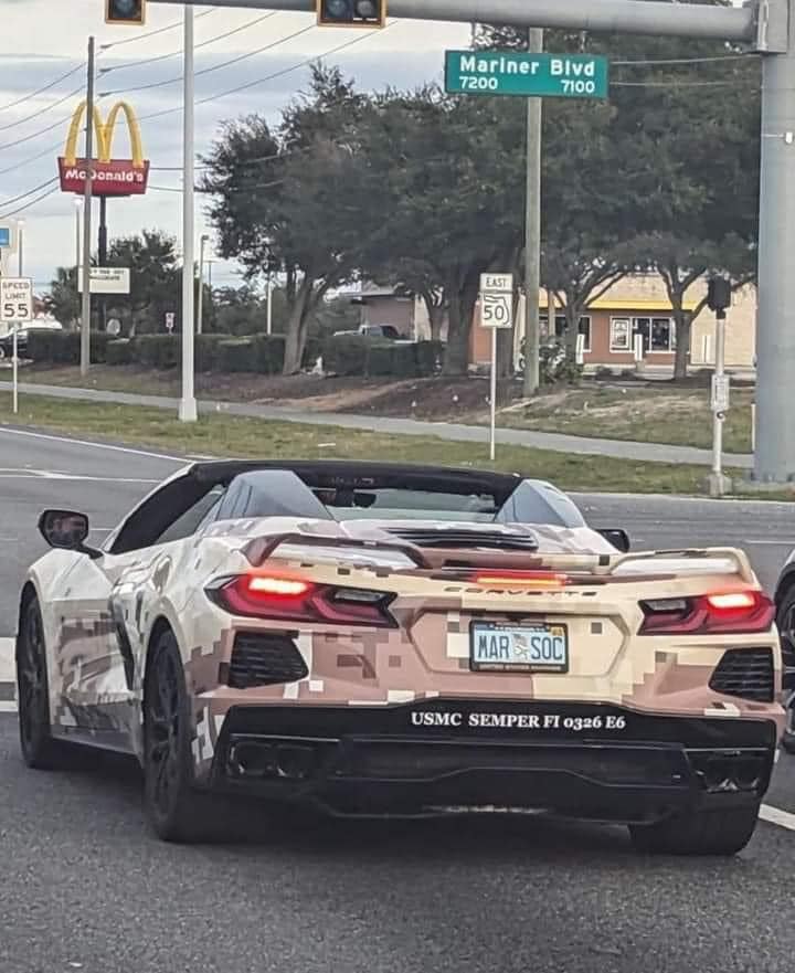 camouflaged wrapped Corvette C8