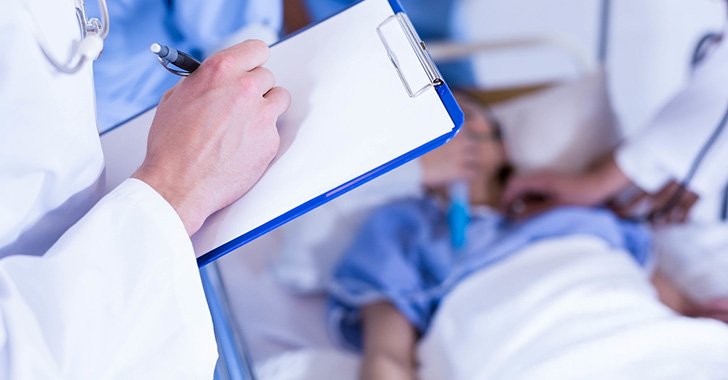 Doctors looking after a patient